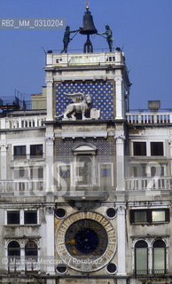 Venice, about 1990. Clock Tower in Saint Marks Square / Venezia, 1990 circa. La Torre dellorologio in piazza San Marco - ©Marcello Mencarini/Rosebud2