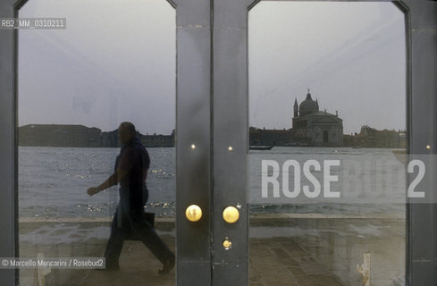 Venice, about 1990. Reflected in the glass, the Church of the Redeemer on the island of Giudecca / Venezia, 1990 circa. Riflessa nel vetro, La chiesa del Redentore sullisola della Giudecca - ©Marcello Mencarini/Rosebud2
