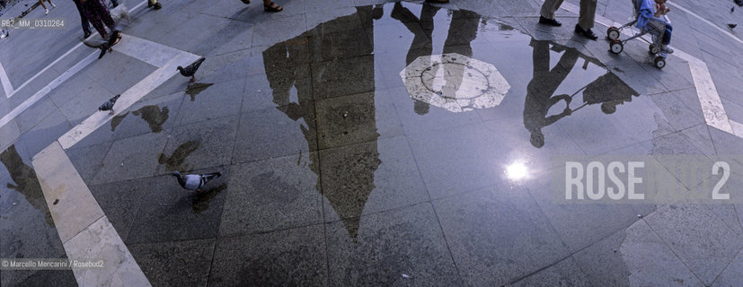 Venice. St. Marks square, the bell tower reflected in a puddle / Venezia, piazza San Marco, il campanile riflesso in una pozzanghera - ©Marcello Mencarini/Rosebud2