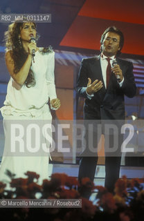 Sanremo Music Festival 1987. Italian pop singers Al Bano and Romina Power performing the song Nostalgia canaglia, came in third place. Romina is pregnant with daughter Romina jr. / Festival di Sanremo 1987. I cantanti Al Bano e Romina Power cantano la canzone Nostalgia canaglia, terza classificata. Romina è incinta della figlia Romina jr. - ©Marcello Mencarini/Rosebud2