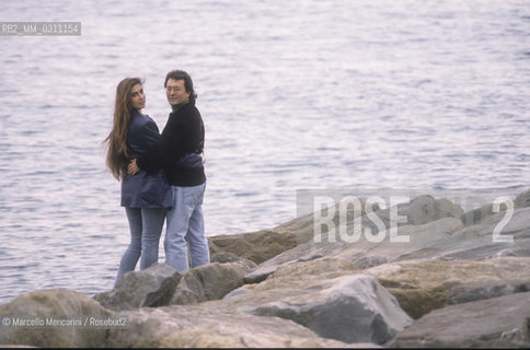 Sanremo Music Festival 1989. Italian pop singers Al Bano and Romina Power, at the Festival with the song Cara terra mia, posing on the beach in Sanremo / Festival di Sanremo 1989. I cantanti Al Bano e Romina Power, al Festival con la canzone terza classificata Cara Terra mia, posano sulla spiaggia di Sanremo - ©Marcello Mencarini/Rosebud2