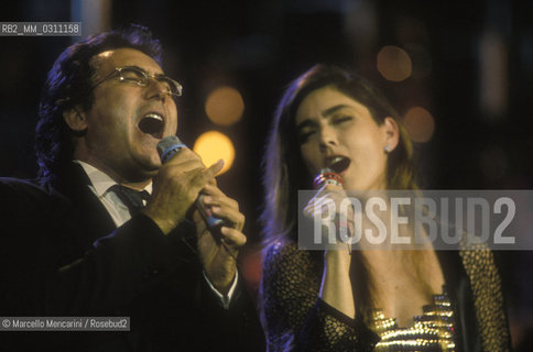 Sanremo Music Festival 1991. Italian pop singers Al Bano and Romina Power performing their song Oggi sposi / Festival di Sanremo 1991. I cantanti Al Bano e Romina Power cantano la canzone Oggi sposi - ©Marcello Mencarini/Rosebud2