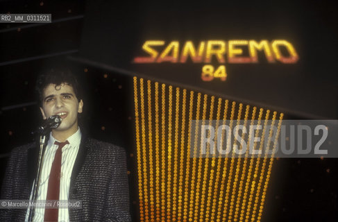 Sanremo Music Festival 1984. Italian pop singer Marco Armani performing the song Solo con lanima mia, came second in the New Proposals Category / Festival di Sanremo, 1984. Il cantante Marco Armani canta la canzone Solo con lanima mia, seconda classificata nella categoria Nuove proposte - ©Marcello Mencarini/Rosebud2
