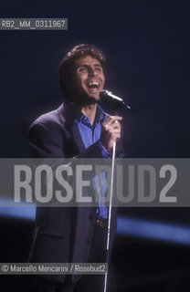 Sanremo Music Festival 1988. Luca Barbarossa performs his song Lamore rubato (ranked third) / Festival di Sanremo 1988. Il cantante Luca Barbarossa canta Lamore rubato (terza classificata) - ©Marcello Mencarini/Rosebud2