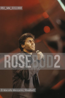 Sanremo Music Festival 1988. Luca Barbarossa performs his song Lamore rubato (ranked third) / Festival di Sanremo 1988. Il cantante Luca Barbarossa canta Lamore rubato (terza classificata) - ©Marcello Mencarini/Rosebud2