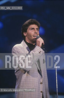 Sanremo Music Festival 1988. Luca Barbarossa performs his song Lamore rubato (ranked third) / Festival di Sanremo 1988. Il cantante Luca Barbarossa canta Lamore rubato (terza classificata) - ©Marcello Mencarini/Rosebud2