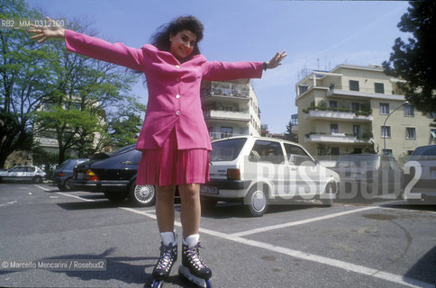 Rome, 1992. Opera singer Cecilia Bartoli with roller skates / Roma, 1992. La cantante lirica Cecilia Bartoli con i pattini a rotelle - ©Marcello Mencarini/Rosebud2