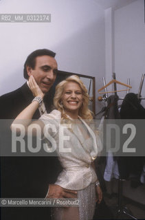 Rome 1984. Italian TV presenter Pippo Baudo and showgirl Heather Parisi before the TV programme Fantastico 5 / Roma, 1984. Il presentatore TV Pippo Baudo e la showgirl Heather Parisi prima della trasmissione Fantastico 5  - ©Marcello Mencarini/Rosebud2