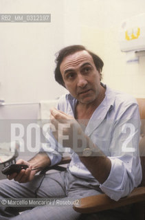 Sanremo Music Festival 1985. Italian TV presenter Pippo Baudo in his dressing room before performing / Festival di Sanremo 1985. Il presentatore TV Pippo Baudo nel suo camerino prima dello spettacolo - ©Marcello Mencarini/Rosebud2
