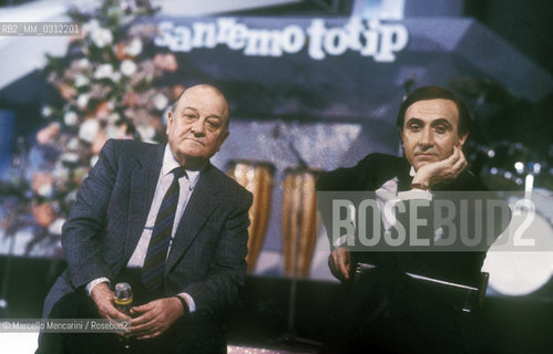 Sanremo Music Festival 1985. Italian music promoter Gianni Ravera and TV presenter Pippo Baudo / Festival di Sanremo 1985. Gianni Ravera, organizzatore di eventi musicali, e il presentatore TV Pippo Baudo - ©Marcello Mencarini/Rosebud2