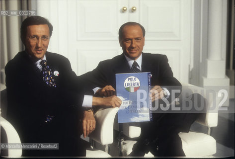Rome, 1996. Politicians Gianfranco Fini and Silvio Berlusconi take part in the TV program Porta a Porta to present the electoral program of their party, the Polo delle Libertà (PDL) / Roma, 1996. I politici Gianfranco Fini e Silvio Berlusconi intervengono nel programma TV Porta a Porta per presentare il programma elettorale del loro partito, il Polo delle Libertà - ©Marcello Mencarini/Rosebud2
