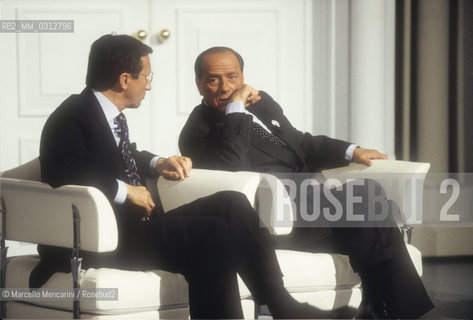Rome, 1996. Politicians Gianfranco Fini and Silvio Berlusconi take part in the TV program Porta a Porta to present the electoral program of their party, the Polo delle Libertà (PDL) / Roma, 1996. I politici Gianfranco Fini e Silvio Berlusconi intervengono nel programma TV Porta a Porta per presentare il programma elettorale del loro partito, il Polo delle Libertà - ©Marcello Mencarini/Rosebud2