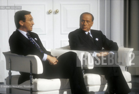 Rome, 1996. Politicians Gianfranco Fini and Silvio Berlusconi take part in the TV program Porta a Porta to present the electoral program of their party, the Polo delle Libertà (PDL) / Roma, 1996. I politici Gianfranco Fini e Silvio Berlusconi intervengono nel programma TV Porta a Porta per presentare il programma elettorale del loro partito, il Polo delle Libertà - ©Marcello Mencarini/Rosebud2