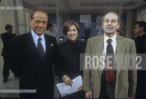 Rome, 1996. Italian politician Silvio Berlusconi, journalist Lucia Annunziata and politician Fausto Bertinotti in the Studios of RAI, Italian public television/ Roma, 1996. Il politico Silvio Berlusconi, la giornalista Lucia Annunziata e il politico Fausto Bertinotti negli studi televisivi della RAI - ©Marcello Mencarini/Rosebud2