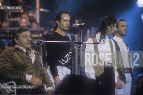 Italian singer-songwriter Pierangelo Bertoli and the Tazenda performing the song Spunta la luna dal monte (Tick the moon from the mountain) / Festival di Sanremo 1991. Il cantautore Pierangelo Bertoli e i Tazenda cantano Spunta la luna dal monte - ©Marcello Mencarini/Rosebud2
