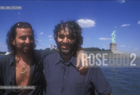 New York City, July 5, 2000. Singer Andrea Bocelli and his brother Alberto (on the left) on ferry between Battery Park in Manhattan and Liberty State Park. They are in New York City for Bocellis Statue of Liberty Concert at New Jerseys Liberty State Park in honor of Italian immigrants / New York, 5 luglio 2000. Il cantante Andrea Bocelli con suo fratello Alberto (a sinistra) sul traghetto tra Battery Park a Manhattan e Liberty State Park. Sono a New York per il concerto di Bocelli sotto la statua della Libertà a Liberty State Park in onore degli immigrati italiani - ©Marcello Mencarini/Rosebud2