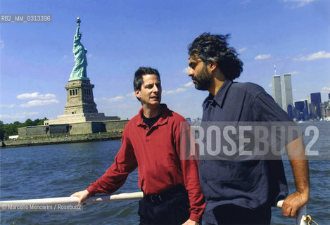 New York City, July 5, 2000. Singer Andrea Bocelli (on the right) and conductor Steven Mercurio on ferry between Battery Park in Manhattan and Liberty State Park. They are in New York City for Bocellis Statue of Liberty Concert at New Jerseys Liberty State Park in honor of Italian immigrants / New York, 5 luglio 2000. Il cantante Andrea Bocelli (a destra) con il direttore dorchestra Steven Mercurio sul traghetto tra Battery Park a Manhattan e Liberty State Park. Sono a New York per il concerto di Bocelli sotto la statua della Libertà a Liberty State Park in onore degli immigrati italiani - ©Marcello Mencarini/Rosebud2