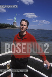 New York City, July 5, 2000. American conductor Steven Mercurio on ferry between Battery Park in Manhattan and Liberty State Park. He is in New York City for conducting Andrea Bocellis Statue of Liberty Concert at New Jerseys Liberty State Park in honor of Italian immigrants / New York, 5 luglio 2000. Il direttore dorchestra Steven Mercurio sul traghetto tra Battery Park a Manhattan e Liberty State Park. E a New York per dirigere il concerto di Andrea Bocelli Bocelli sotto la statua della Libertà a Liberty State Park in onore degli immigrati italiani - ©Marcello Mencarini/Rosebud2