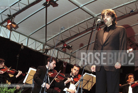 San Giovanni Rotondo (Foggia), 29 April 2000. Andrea Bocelli performing the concert on occasion of the first anniversary of the beatification of Padre Pio / San Giovanni Rotondo (Foggia), 29 aprile 2000. Andrea Bocelli durante il concerto per il primo anniversario della beatificazione di Padre Pio - ©Marcello Mencarini/Rosebud2