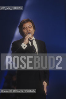 Sanremo Music Festival 1989. Italian pop singer Fred bongusto performing the song Scusa/ Festival di Sanremo 1989. Fred Bongusto canta la canzone Scusa - ©Marcello Mencarini/Rosebud2