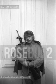 Bologna, 1981. Italian cartoonist Bonvi (Franco Bonvicini) in his studio dressed as a character of his comic strip Sturmtruppen / Il fumettista Bonvi (Franco Bonvicini) nel suo studio vestito come un personaggio della sua striscia Sturmtruppen, 1981 - ©Marcello Mencarini/Rosebud2