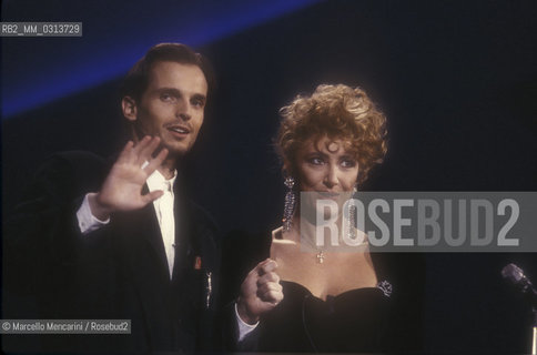Sanremo Festival 1988. Festival TV presenters Miguel Bosè and Gabriella Carlucci / Festival di Sanremo 1988. I presentatori del Festival Miguel Bosé e Gabriella Carlucci - ©Marcello Mencarini/Rosebud2