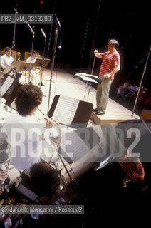 French composer and conductor Pierre Boulez conducting (1985) / Il compositore e direttore dorchestra Pierre Boulez mentre dirige (1985) - ©Marcello Mencarini/Rosebud2