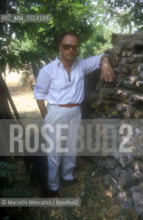 Genazzano (Rome), 1988. Italian composer Sylvano Bussotti in the garden of his home / Genazzano (Roma), 1988. Il compositore Sylvano Bussotti nel giardino della sua casa - ©Marcello Mencarini/Rosebud2