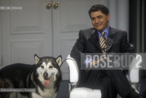 Rome, 1996. Italian politician Rocco Buttiglione and his dog participating in a tv show / Roma, 1996. Il politico Rocco Buttiglione e il suo cane durante la trasmissione televisiva Porta a porta - ©Marcello Mencarini/Rosebud2