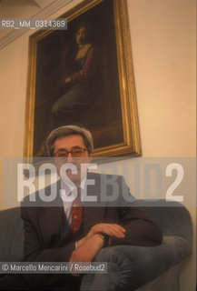 Rome, 1995. Italian musicologist Bruno Cagli in front of a portrait of Saint Cecilia  patroness of musicians / Roma, 1995. Il musicologo Bruno Cagli davanti a un ritratto di Santa Cecilia, patrona dei musicisti - ©Marcello Mencarini/Rosebud2