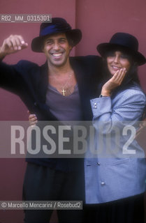 Venice Lido, Venice Film Festival 1988. Italian pop singer Adriano Celentano and his wife Claudia Mori / Lido di Venezia, Mostra del Cinema di Venezia 1988. Il cantante Adriano Celentano con sua moglie Claudia Mori - ©Marcello Mencarini/Rosebud2