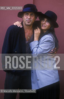 Venice Lido, Venice Film Festival 1988. Italian pop singer Adriano Celentano and his wife Claudia Mori / Lido di Venezia, Mostra del Cinema di Venezia 1988. Il cantante Adriano Celentano con sua moglie Claudia Mori - ©Marcello Mencarini/Rosebud2