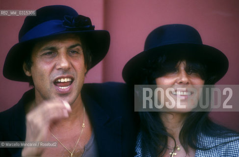 Venice Lido, Venice Film Festival 1988. Italian pop singer Adriano Celentano and his wife Claudia Mori / Lido di Venezia, Mostra del Cinema di Venezia 1988. Il cantante Adriano Celentano con sua moglie Claudia Mori - ©Marcello Mencarini/Rosebud2