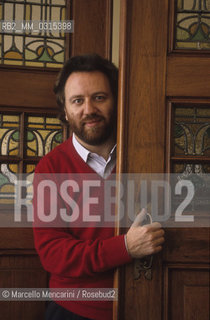 Amsterdam, 1991. Riccardo Chailly,  conductor of the Royal Concertgebouw Orchestra (KCO), opens the door of his house / Amsterdam, 1991. Riccardo Chailly, direttore della  Royal Concertgebouw Orchestra (KCO), apre la porta della sua casa di Amsterdam - ©Marcello Mencarini/Rosebud2