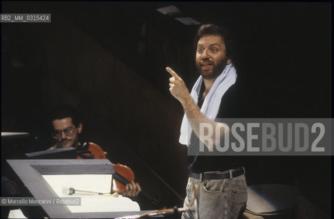 Amsterdam 1991. Italian conductor Riccardo Chailly performing a rehearsal with the Royal Concertgebouw Orchestra / Riccardo Chailly dirige lOrchestra del Concertgebouw durante una prova - ©Marcello Mencarini/Rosebud2