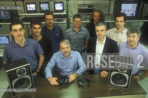 Turin, 1999. Leonardo Chiariglione and his staff. Engineer Chiariglione is member of CSELT (corporate research center of Telecom Italy), founder of the MPEG group, inventor of the format MPEG-1, MPEG-2 and MP3 / Torino, 1999. Leonardo Chiariglione e il suo staff. Lingegner Chiariglione è membro del CSELT (centro ricerche aziendale di Telecom Italia), fondatore del gruppo MPEG, inventore del  formato standard MPEG-1, MPEG-2 e MP3 - ©Marcello Mencarini/Rosebud2