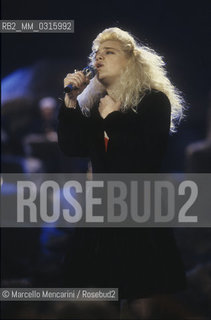 Sanremo Music Festival 1990. American pop singer Nikka Costa performing the song All for the Love, English version of Vattene Amore sung by Amedeo Minghi and Mietta / Festival di Sanremo 1990. Nikka Costa canta , versione inglese di Vattene Amore cantata da Amedeo Minghi e Mietta- ©Marcello Mencarini/Rosebud2
