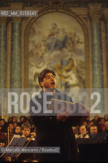 Rome, Basilica of Santa Maria degli Angeli (Saint Mary of the Angels), 1999. Argentinian tenor opera singer José Cura performing a rehearsal / Il tenore José Cura durante una prova - ©Marcello Mencarini/Rosebud2
