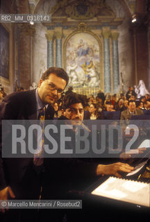 Rome, Basilica of Santa Maria degli Angeli (Saint Mary of the Angels), 1999. Italian music promoter Enrico Castiglione and Argentinian tenor opera singer José Cura during a rehearsal / Lorganizzatore musicale Enrico Castiglione e il tenore José Cura durante una prova - ©Marcello Mencarini/Rosebud2