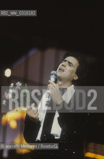 Sanremo Music Festival 1984. Italian pop singer Toto Cutugno, iperforming the song Serenata, that will finish third / Festival di Sanremo 1984. Toto Cutugno canta la canzone Serenata, che si classificherà al terzo posto - ©Marcello Mencarini/Rosebud2