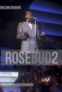 Sanremo Music festival 1987. Italian pop singer Toto Cutugno performing the song Figli, that will finish second / Festival di Sanremo 1987. Toto Cutugno canta la canzone Figli, che si classificherà al secondo posto - ©Marcello Mencarini/Rosebud2