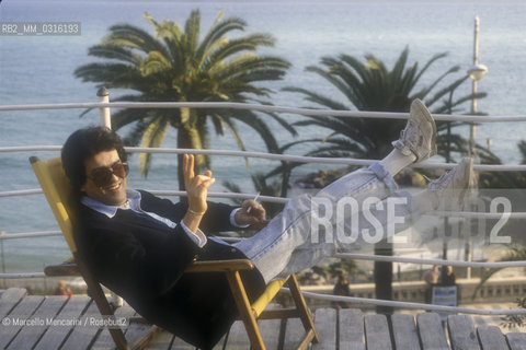 Sanremo Music Festival 1990. Italian pop singer Toto Cutugno, finished in second place with the song Gli amori, on the terrace of the Royal Hotel / Festival di Sanremo 1990. Il cantante Toto Cutugno, classificato al secondo posto con la canzone Gli amori, sulla terrazza dellHotel Royal - ©Marcello Mencarini/Rosebud2
