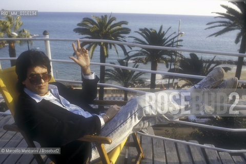 Sanremo Music Festival 1990. Italian pop singer Toto Cutugno, finished in second place with the song Gli amori, on the terrace of the Royal Hotel / Festival di Sanremo 1990. Il cantante Toto Cutugno, classificato al secondo posto con la canzone Gli amori, sulla terrazza dellHotel Royal - ©Marcello Mencarini/Rosebud2