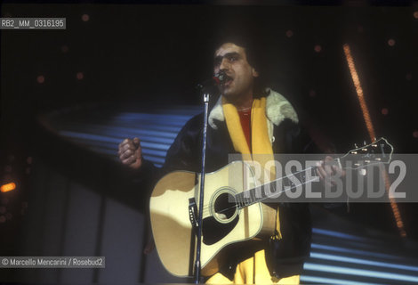 Sanremo Music Festival 1984. Italian pop singer Toto Cutugno, iperforming the song Serenata, that will finish third / Festival di Sanremo 1984. Toto Cutugno canta la canzone Serenata, che si classificherà al terzo posto - ©Marcello Mencarini/Rosebud2