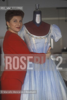 Genoa Carlo Felice Theater 1995. Italian soprano Mariella Devia shows a costume of the opera La Traviata / Genova, Teatro Carlo Felice, 1995. Il soprano Mariella Devia mostra un costume dellopera La Traviata - ©Marcello Mencarini/Rosebud2