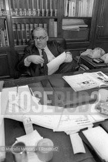 Milan, 1981. Italian journalist Franco Di Bella, editor of the newspaper Il Corriere della Sera, in his office / Milano, 1981. Il giornalista franco Di Bella, direttore del Corriere della sera, nel suo ufficio - ©Marcello Mencarini/Rosebud2
