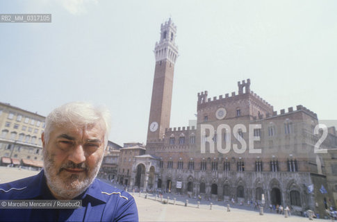 Siena, 1988. Italian composer Franco Donatoni  at Piazza del Campo / Siena, 1988. Il compositore Franco Donatoni in Piazza del Campo - ©Marcello Mencarini/Rosebud2
