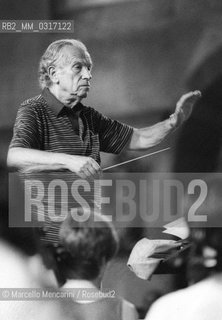 Bolzano, 1984. Born Hungarian naturalized American conductor Antal Dorati during a rehearsal / Bolzano, 1984. Il direttore dorchestra Antal Dorati durante una prova - ©Marcello Mencarini/Rosebud2