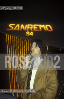 Sanremo Music festival 1984. Italian pop singer Drupi sings Regalami un sorriso (ranked eighth) / Festival di Sanremo 1984. Drupi canta Regalami un sorriso (ottava classificata) - ©Marcello Mencarini/Rosebud2