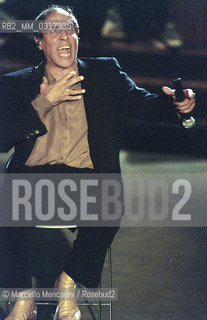 Milan, October 21, 1999. Italian pop singer Adriano Celentano on the set of his TV program Francamente me ne infischio / Milano, 21 ottobre 1999. Il cantante Adriano Celentano sul set del suo programma televisivo Francamente me ne infischio - ©Marcello Mencarini/Rosebud2